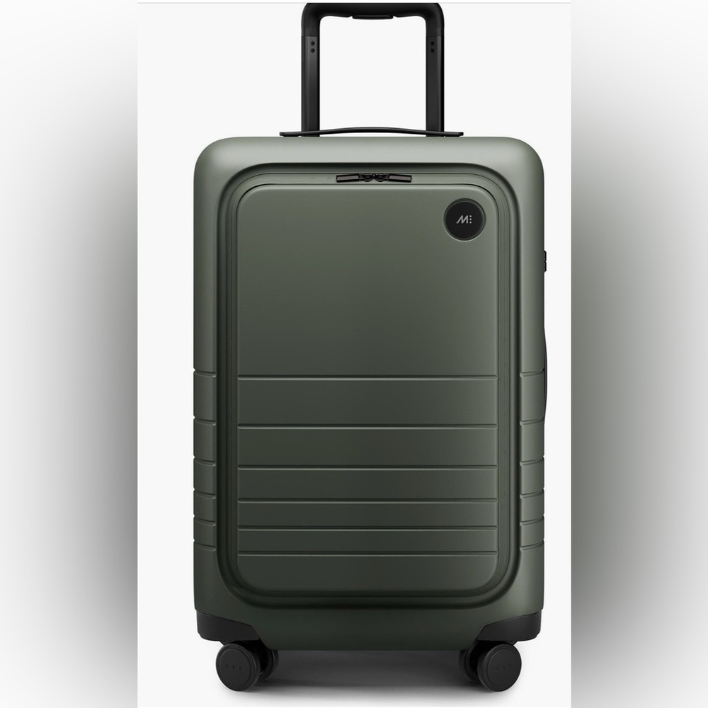 Sleek Green Suitcase with Spinner Wheels